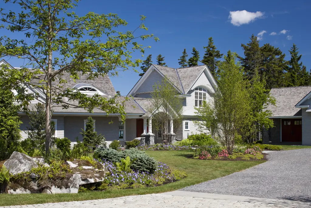 View of house and lawn from approach